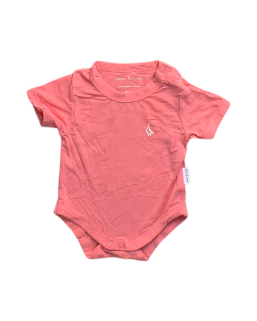 A Peach Short Sleeve Bodysuits from Raph and Remy in size Newborn for neutral. (Front View)