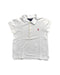 A White Short Sleeve Polos from Ralph Lauren in size 5T for girl. (Front View)