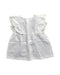 A White Sleeveless Dresses from Lola Palacios in size 6T for girl. (Front View)