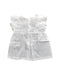 A White Sleeveless Dresses from Lola Palacios in size 6T for girl. (Back View)