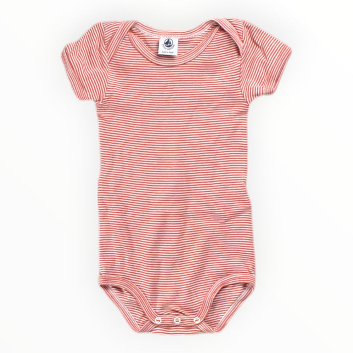 A Red Short Sleeve Bodysuits from Petit Bateau in size 6-12M for neutral. (Front View)