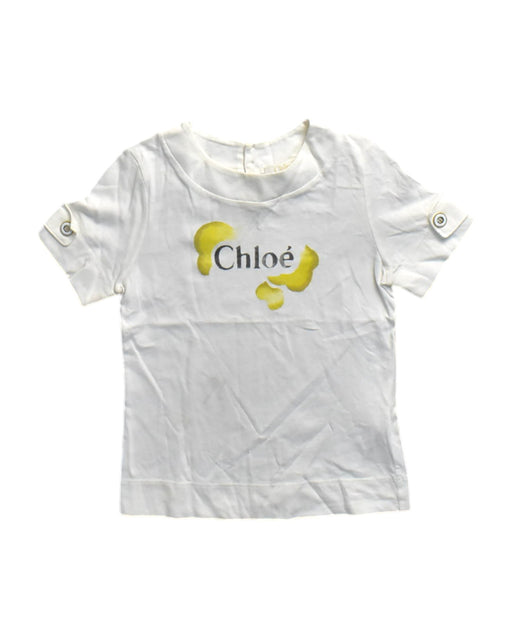 A White Short Sleeve T Shirts from Chloe in size 6T for girl. (Front View)