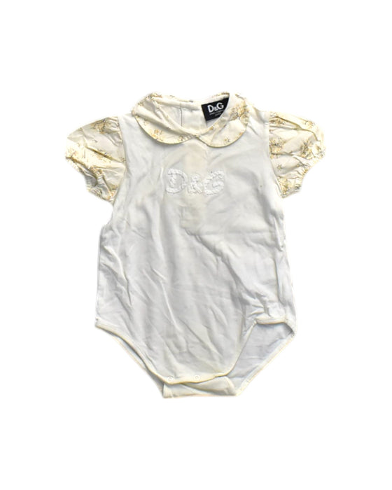 A Ivory Short Sleeve Bodysuits from Dolce & Gabbana in size 6-12M for girl. (Front View)