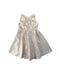 A Ivory Sleeveless Dresses from bloomB in size 14Y for girl. (Front View)