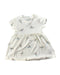 A White Short Sleeve Dresses from Le Petit Society in size 6-12M for girl. (Front View)