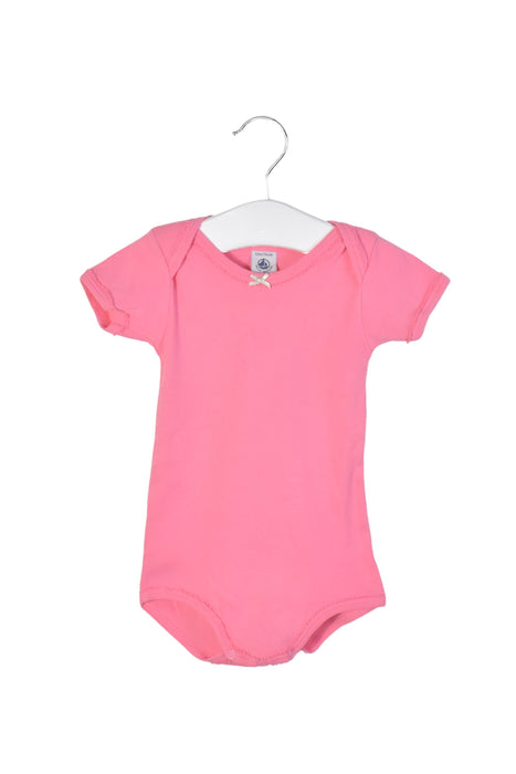 A Pink Short Sleeve Bodysuits from Petit Bateau in size 6-12M for girl. (Front View)