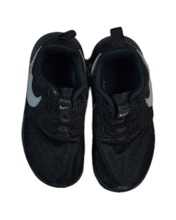 A Black Sneakers from Nike in size 4T for boy. (Back View)